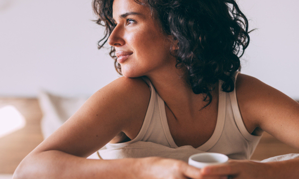 Image of Photo of a woman in bed, relaxed thanks to the neurotransmitter GABA