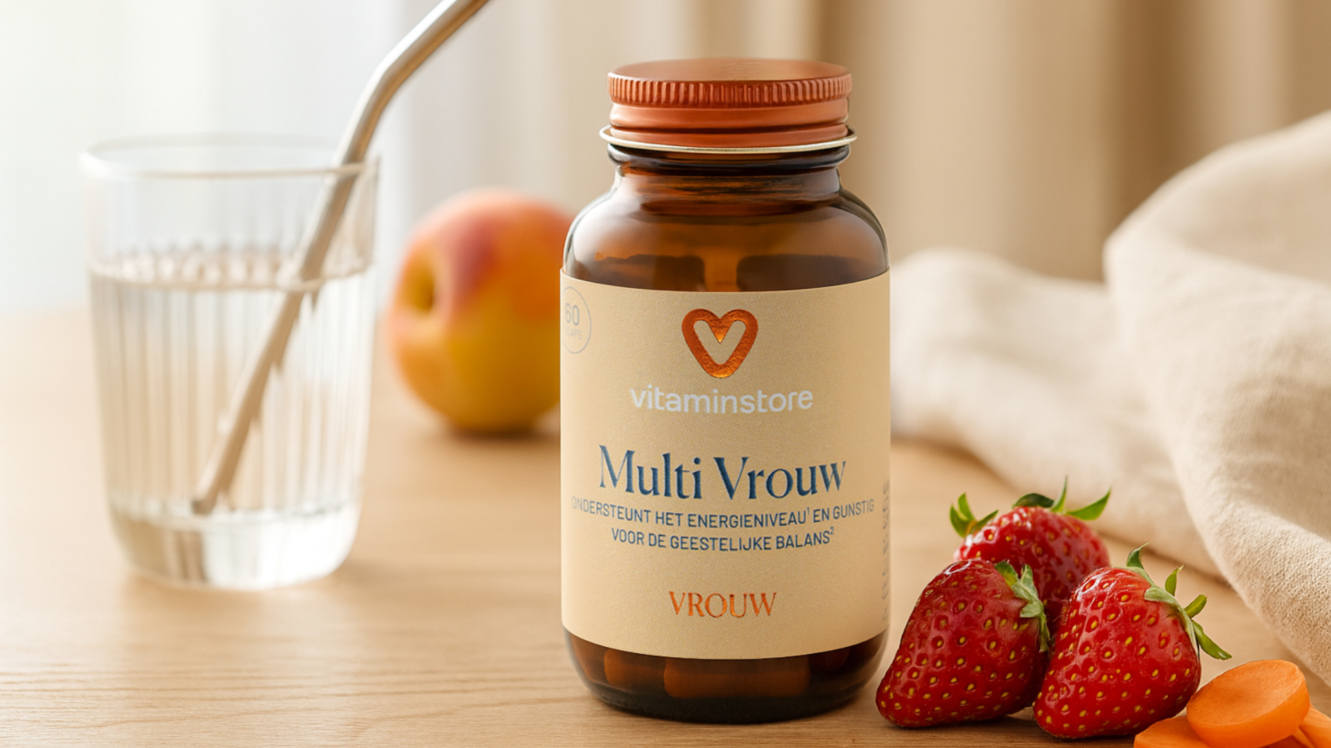 photo of a women's vitamin jar on an orange in a kitchen setting