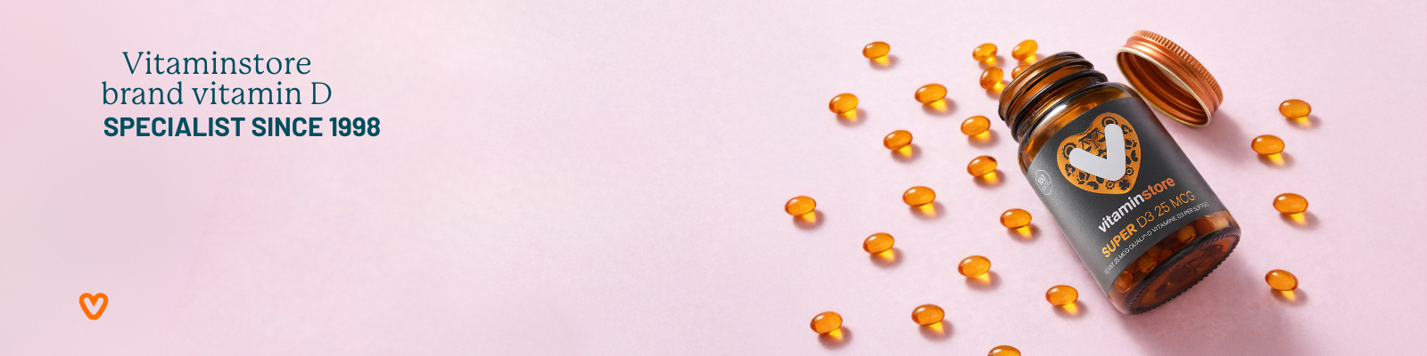 photo of a vitamin D supplement with the capsules on the table