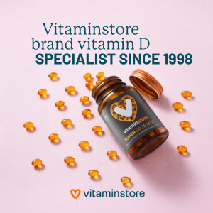 photo of a vitamin D supplement with the capsules on the table